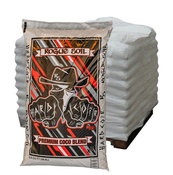 A large white bag of Rogue Soil 'Hard Coir' soil with a red and black label featuring an image of a rocket.