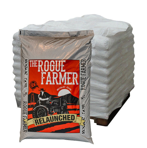 A large white bag of Rogue Soil 'Rogue Farmer' soil with a red and black label featuring an image of a rocket.